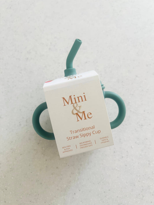 A close-up showing the soft textures and quality craftsmanship of the Mini & Me Transitional Straw Sippy Cup Kale.