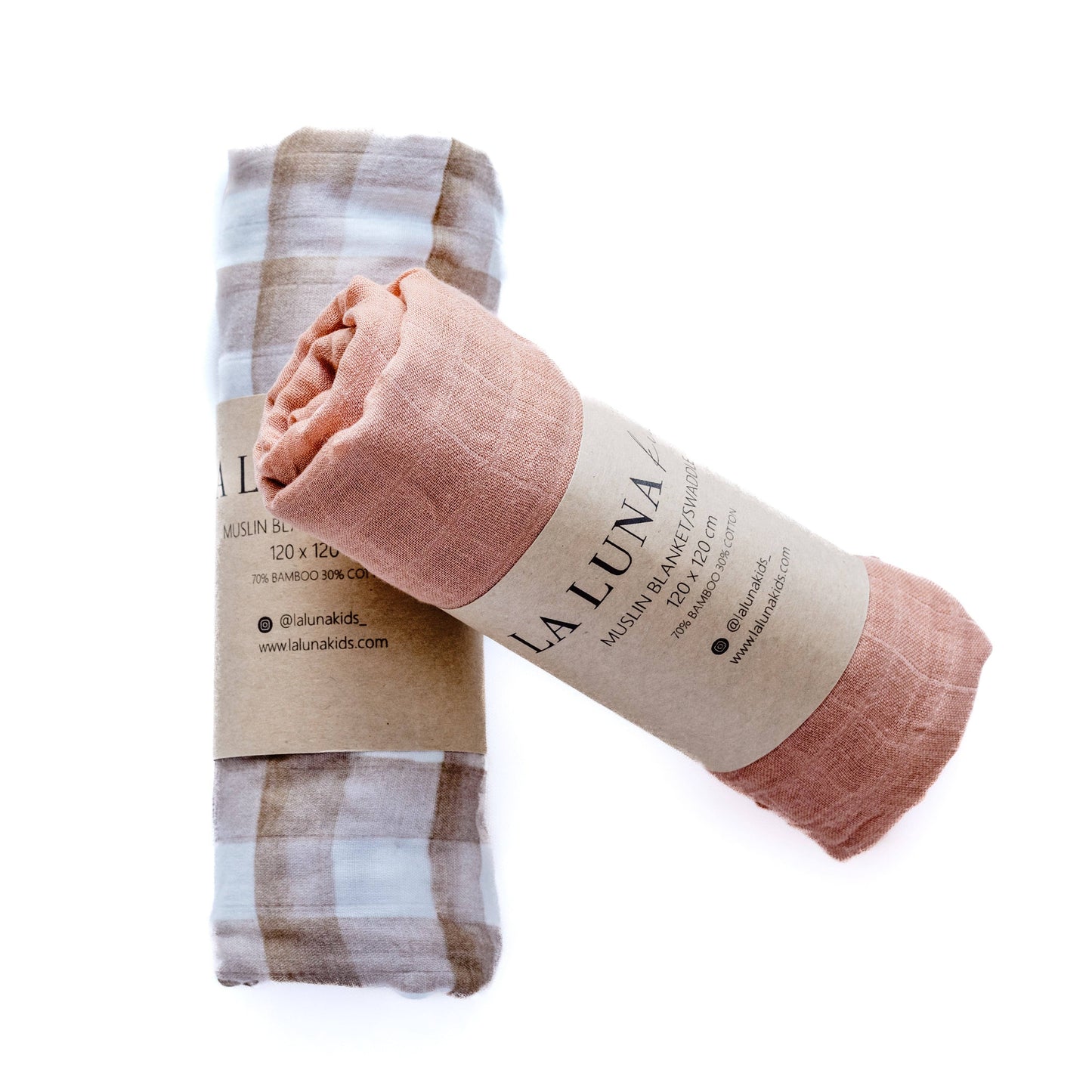 A close-up showing the soft textures and quality craftsmanship of the Peach Swaddle.