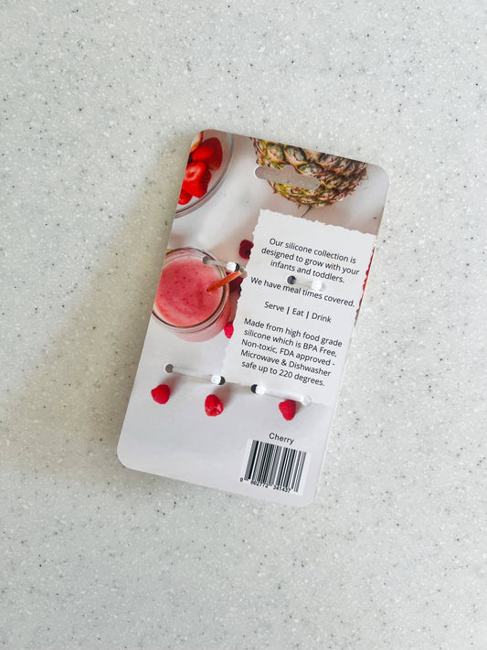 A close-up showing the soft textures and quality craftsmanship of the Mini & Me Training Spoon Set Cherry.