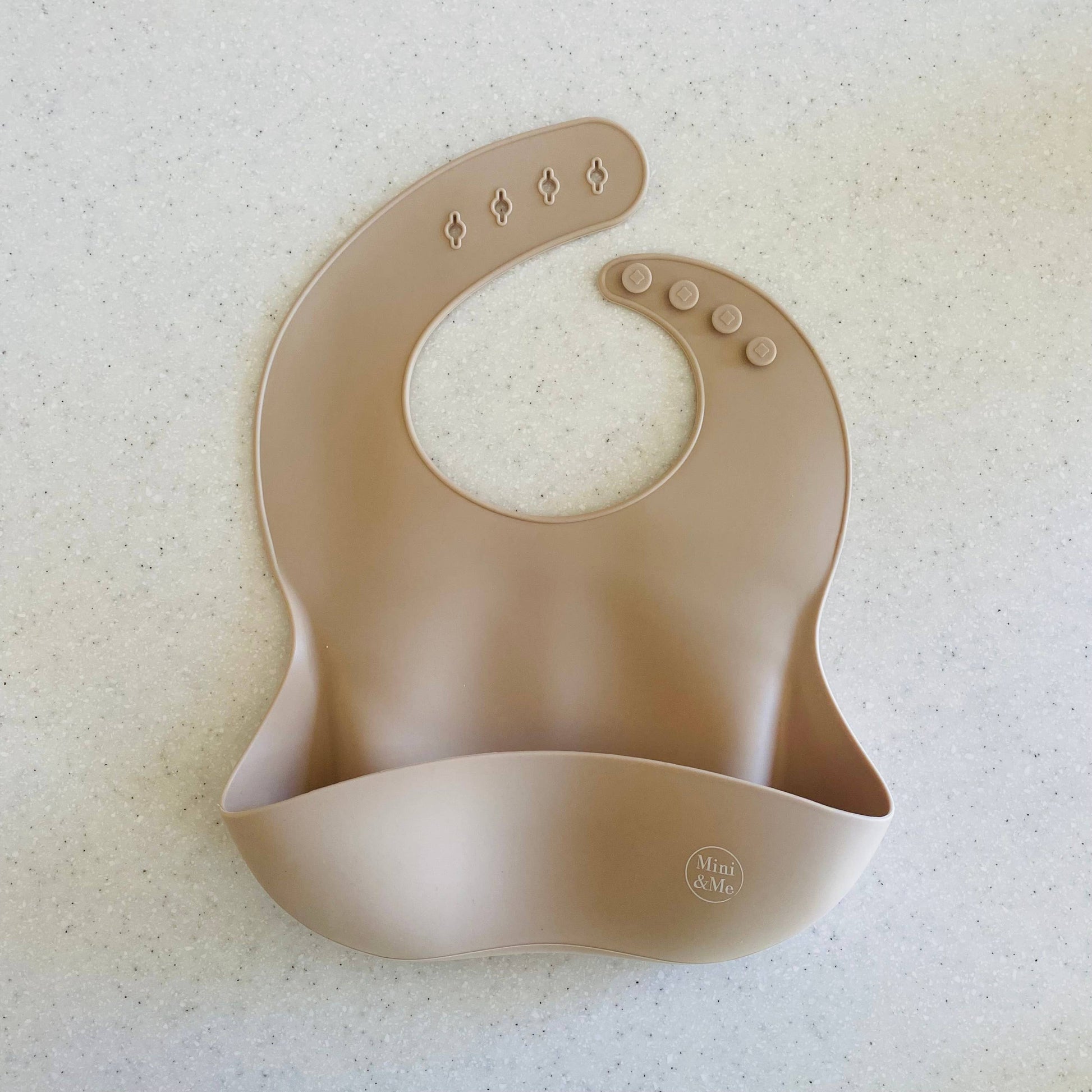 A peaceful moment featuring the Mini & Me Bib as part of a mindful daily routine.
