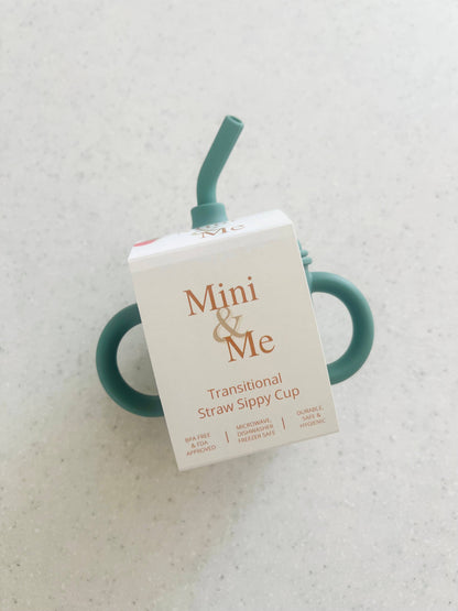 A close-up showing the soft textures and quality craftsmanship of the Mini & Me Transitional Straw Sippy Cup Kale.