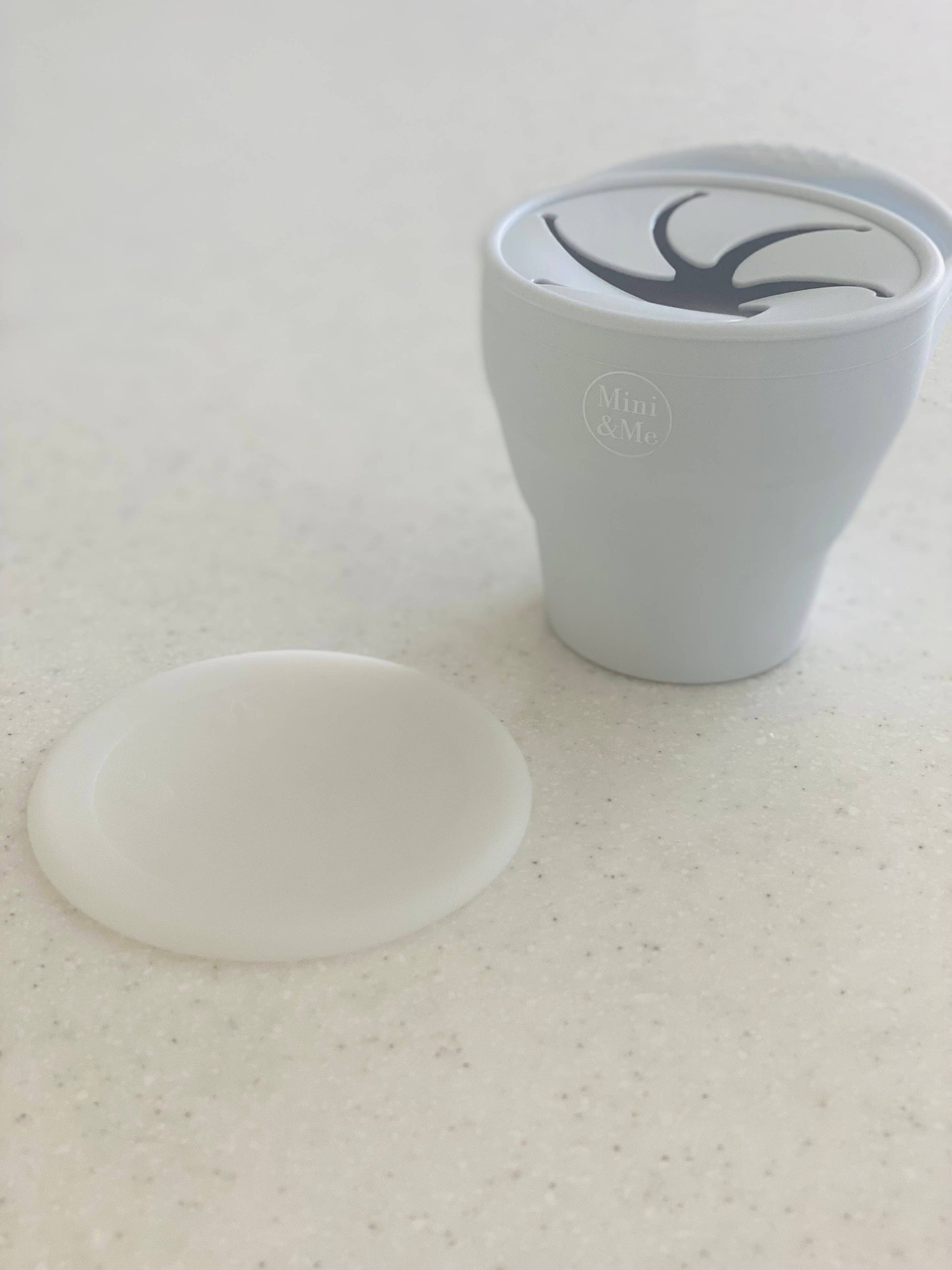 A peaceful moment featuring the Mini & Me Snack Cup Collapsible with Lid as part of a mindful daily routine.
