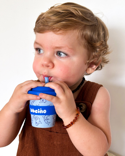 A peaceful moment featuring the BB Shark Babycino Cup - 120ml (STRAW INCLUDED) as part of a mindful daily routine.