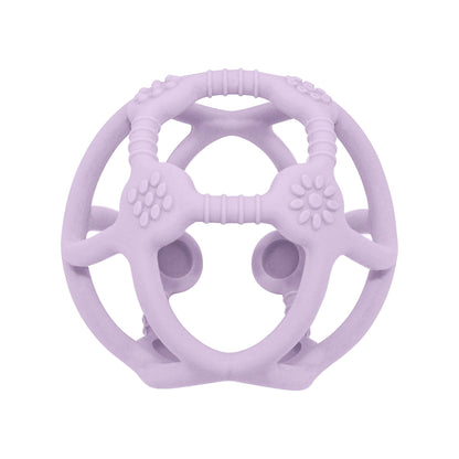 A beautiful lifestyle shot of Playground Silicone Teething Ball - Light Purple by Living Textiles in a home setting.