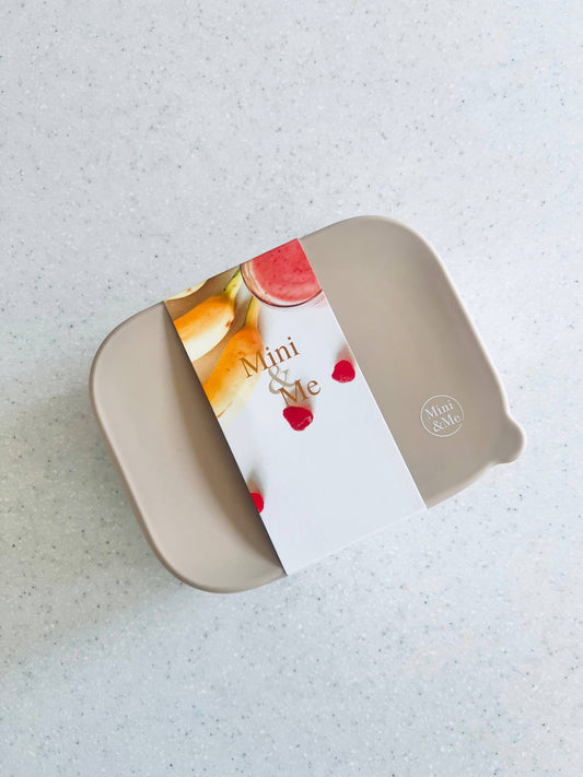 A close-up showing the soft textures and quality craftsmanship of the Stainless Steel Bento Box with Silicone Divider Almond.