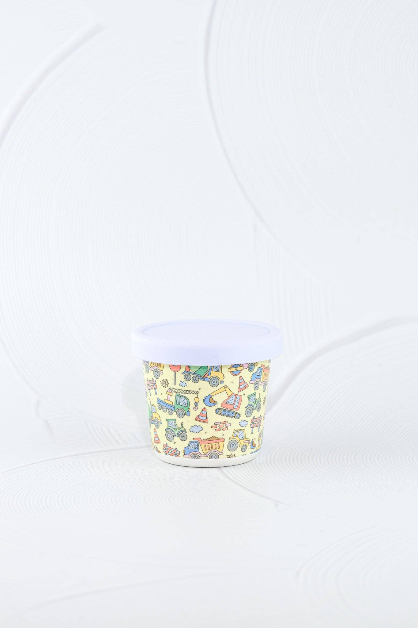 The Dig It Bamboo-Based SNACK POT styled beautifully on a shelf in a child's bedroom.