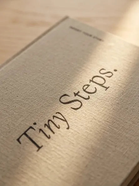 Inspiring text graphic about mindful parenting on a soft, minimalist beige background. Tiny Moments Co