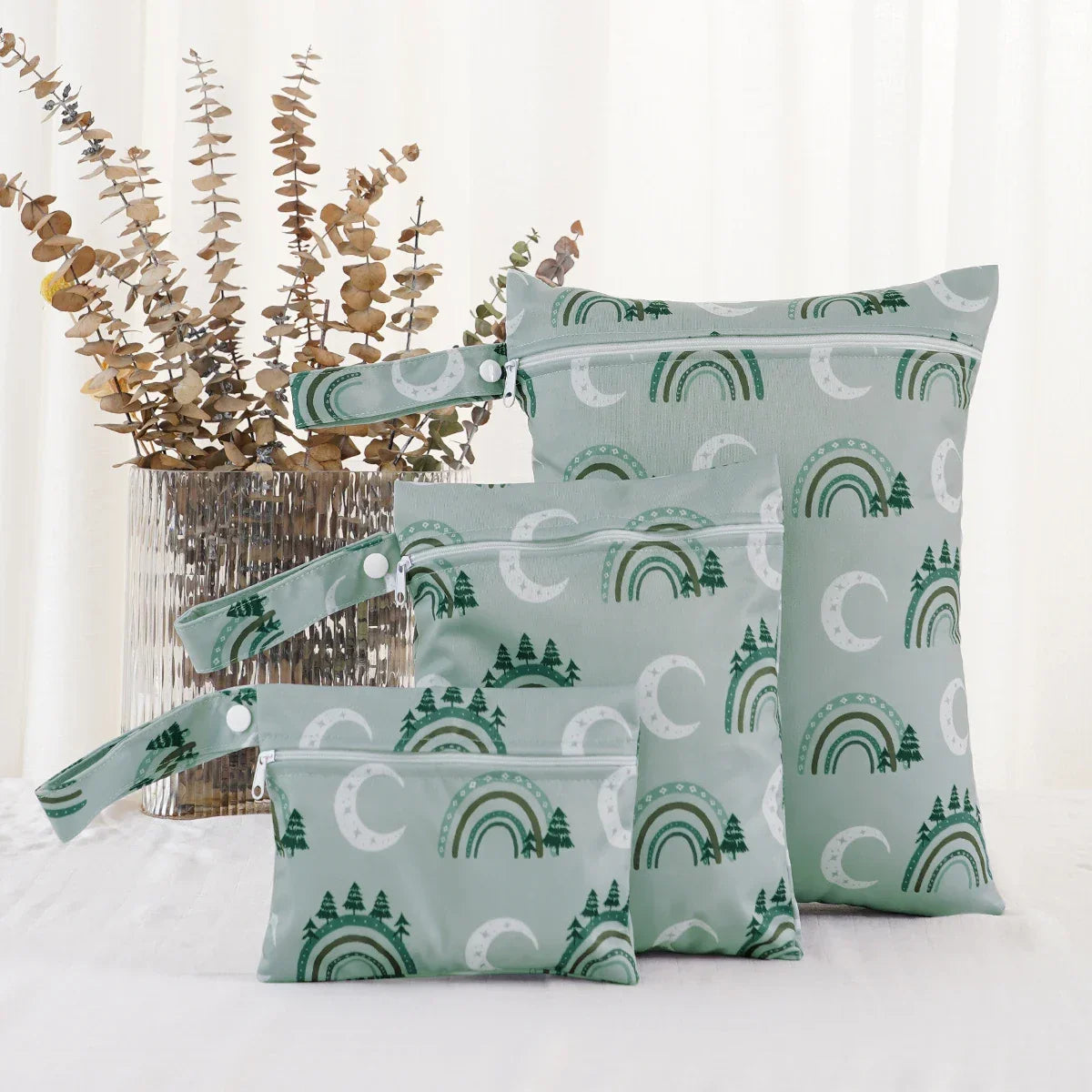 Wet bag set demonstrating compact foldable design for nappy bags