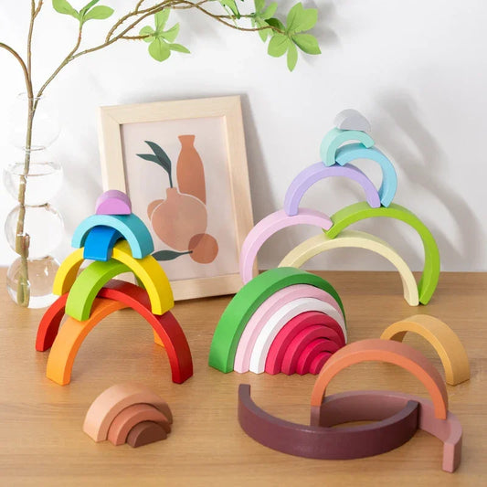 Rainbow stacking arches in natural wood with gentle pastel colors