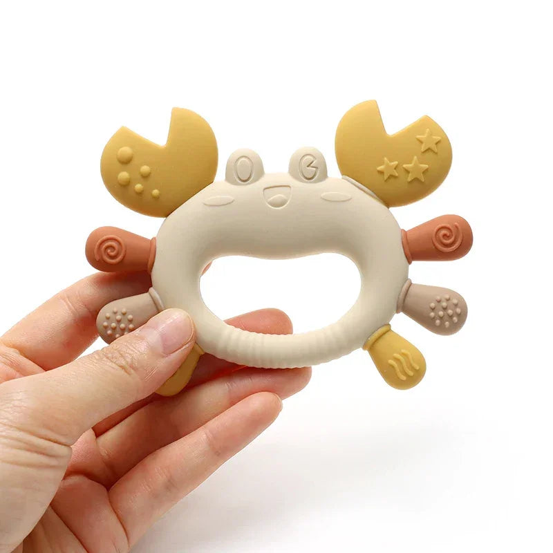 Green crab teether with chillable design for soothing sore gums