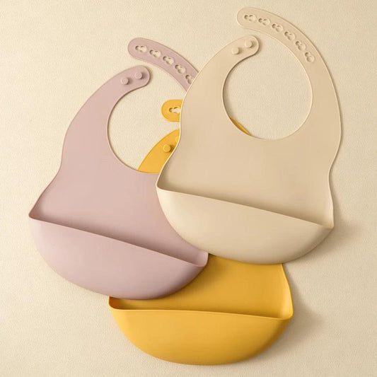 Silicone bib showing adjustable neck closure and food-catching pocket