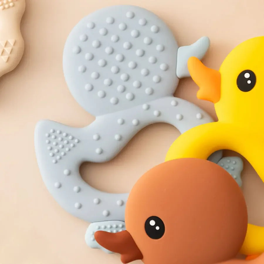 Duck teether showing textured surface for soothing sore gums