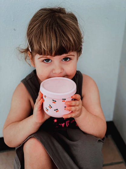 A beautiful lifestyle shot of Cherub Silicone SNACK POT by BBcino in a home setting.