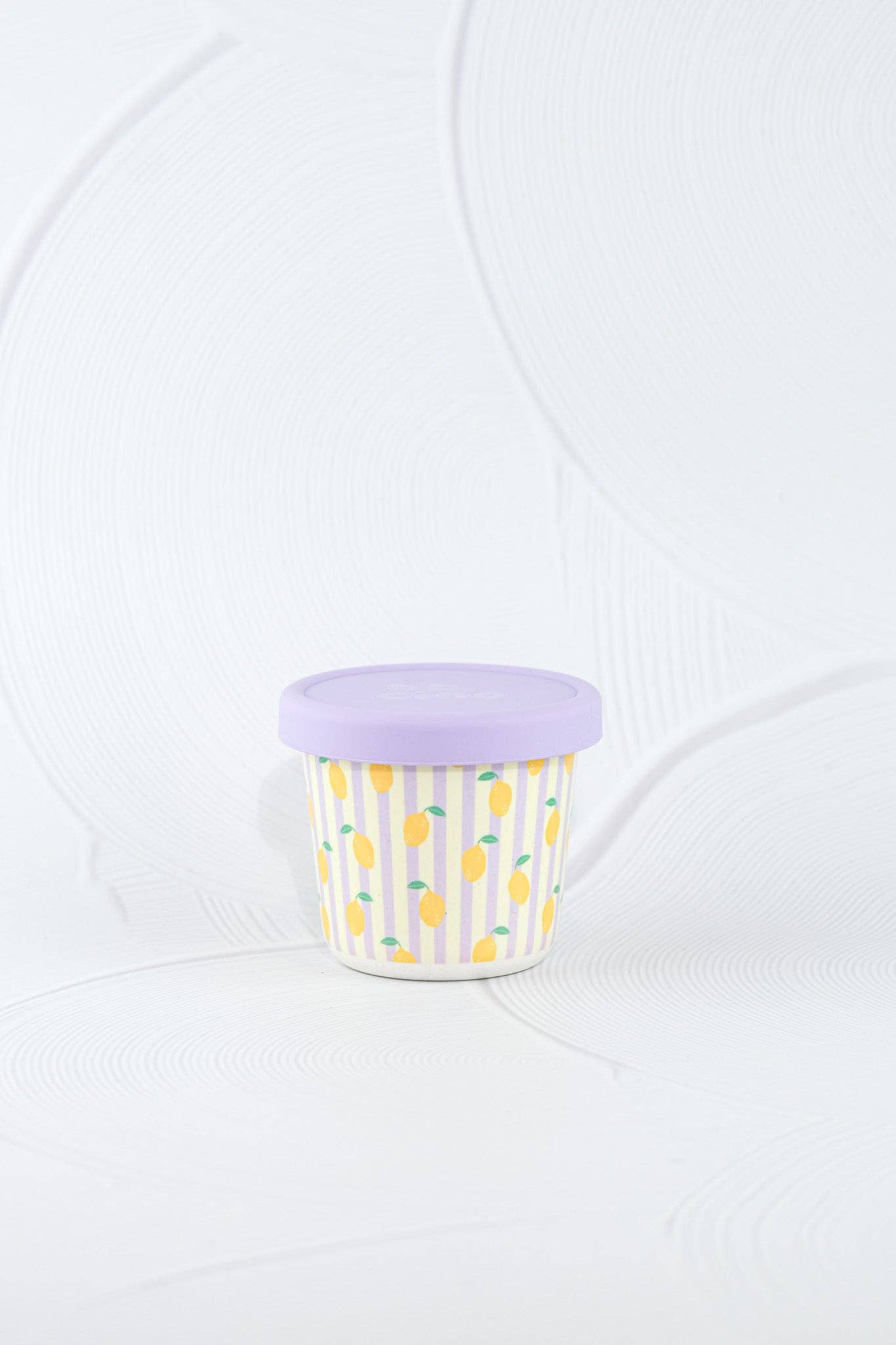 The Zestie Bestie Bamboo-Based SNACK POT styled beautifully on a shelf in a child's bedroom.