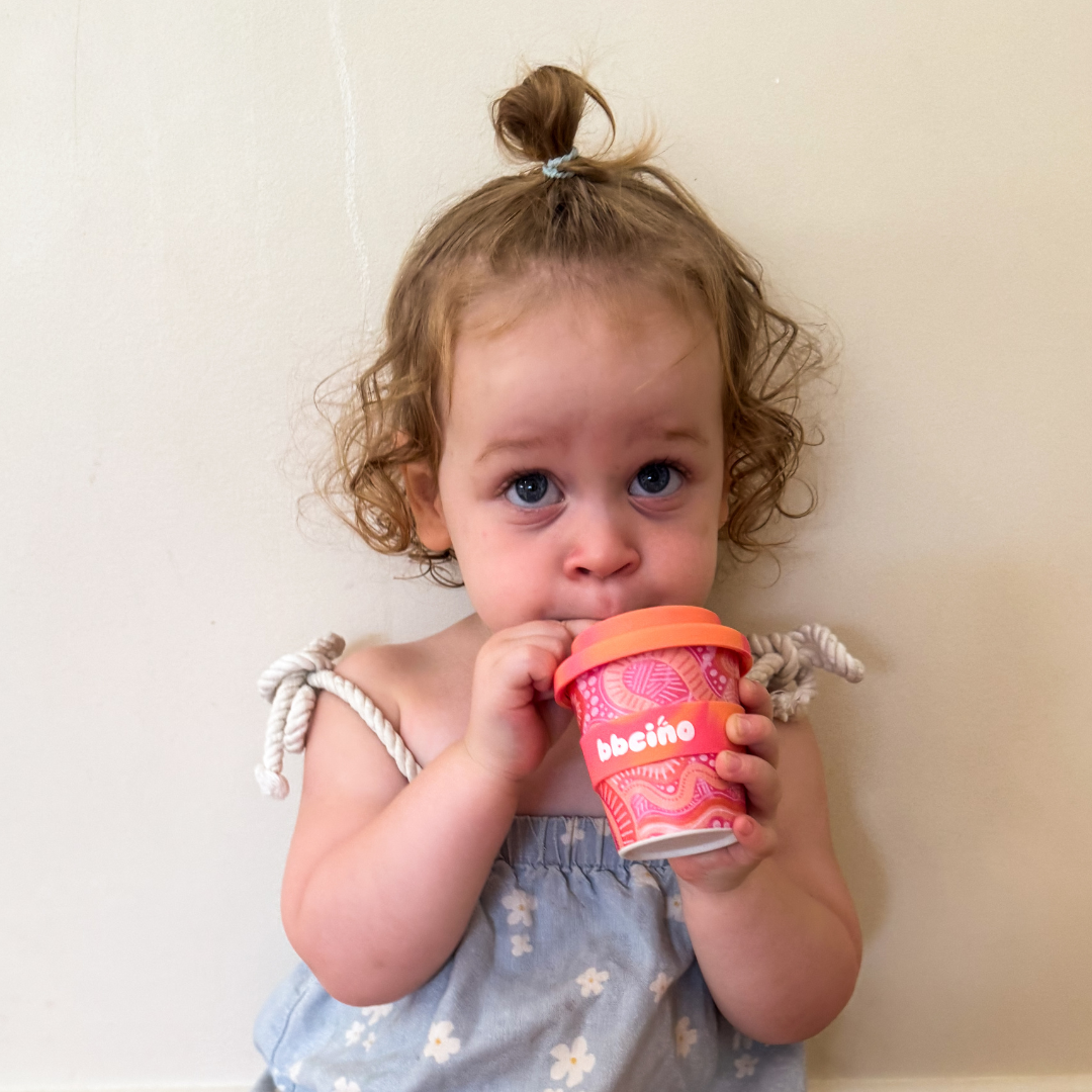 A peaceful moment featuring the Mum and Bub Babycino Cup - 120ml (STRAW INCLUDED) as part of a mindful daily routine.