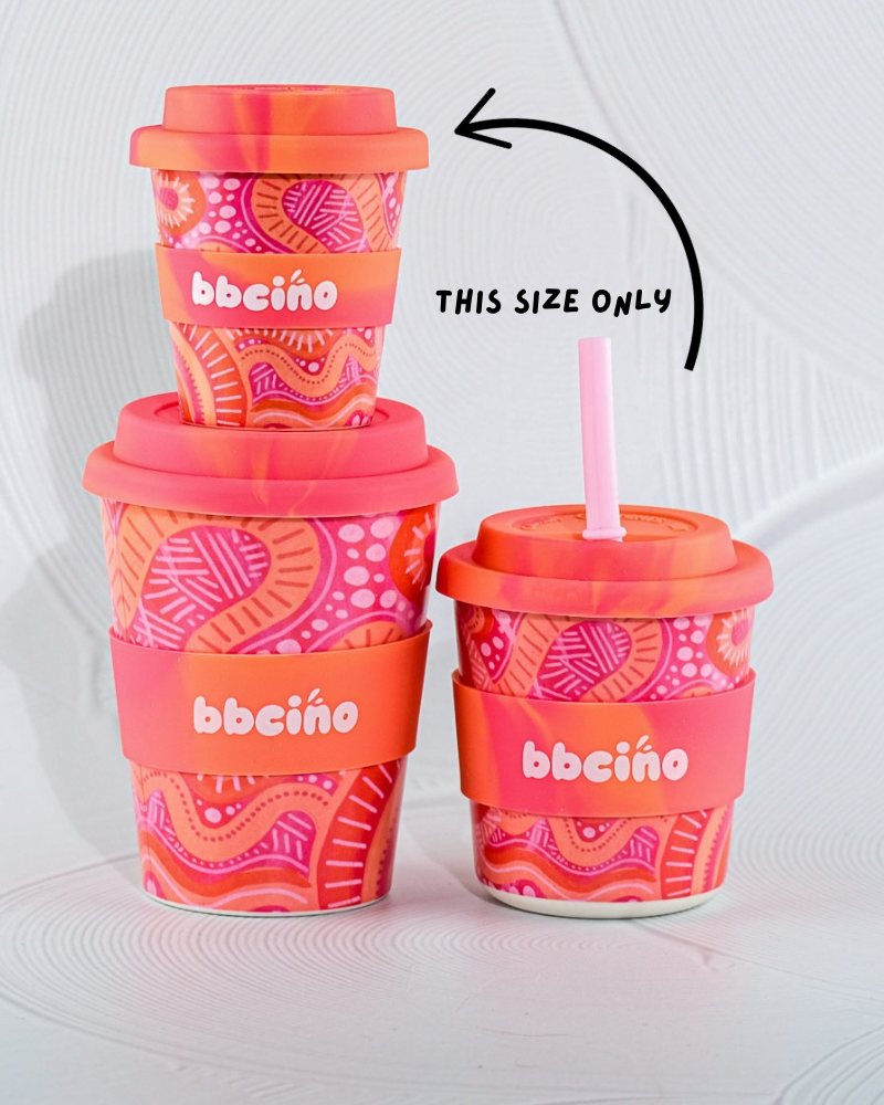 The Mum and Bub Babycino Cup - 120ml (STRAW INCLUDED) styled beautifully on a shelf in a child's bedroom.