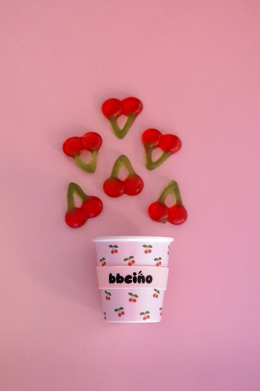 A beautiful lifestyle shot of Cherub Babycino Cup - 120ml (STRAW INCLUDED) by BBcino in a home setting.